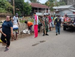 Anggota Koramil-05/Wonreli Bersama Dinas UPT Bapenda Dan Warga Giat Jumat Bersih