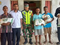 Babinsa Dampingi Pemdes Arwala Giat Pembagian Bantuan Pangan