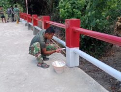 Kodim 1511/Pulau Moa Tuntaskan Pengecatan Jembatan Armco Merah Putih di Wetar Selatan